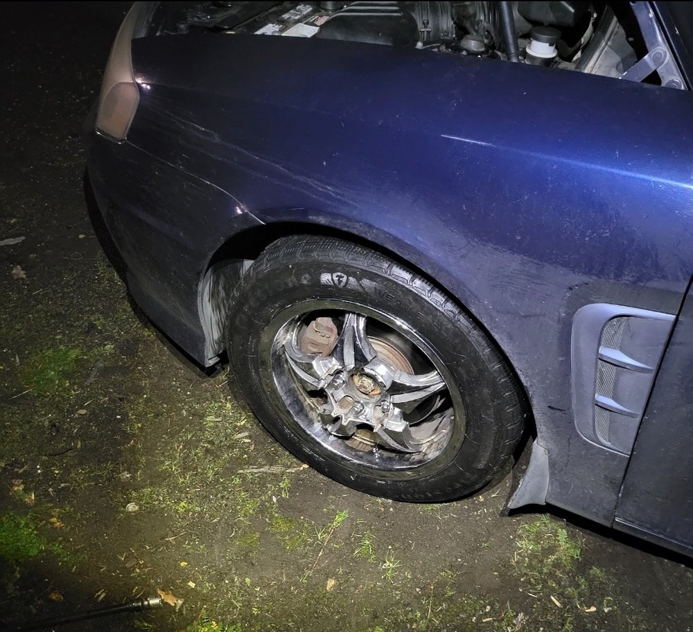 Car wheel service at night